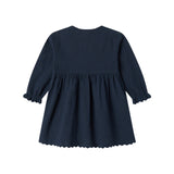 Mørkeblå kjole til børn set bagfra med rynket talje