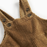 Brun fløjlsoverall til børn med knapper på selerne