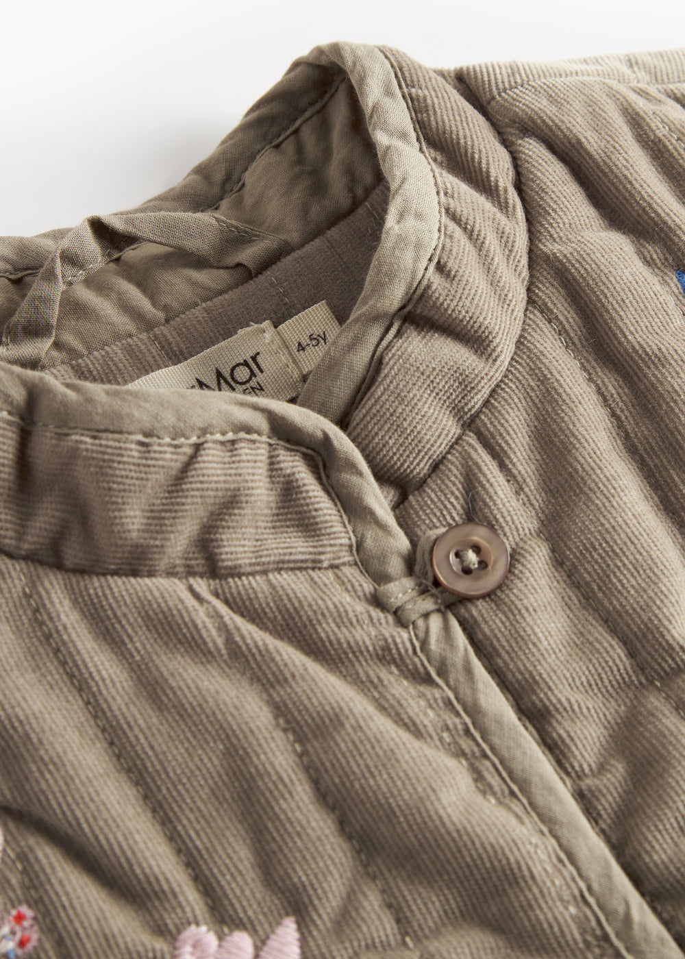 Beige quiltet vest med blomsterbroderi til børn