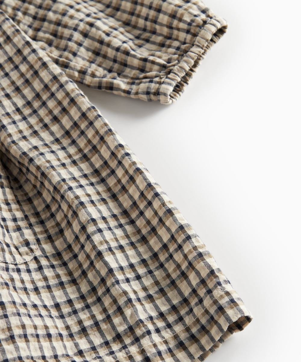 Brun ternet langærmet kjole til børn i crepet bomuld