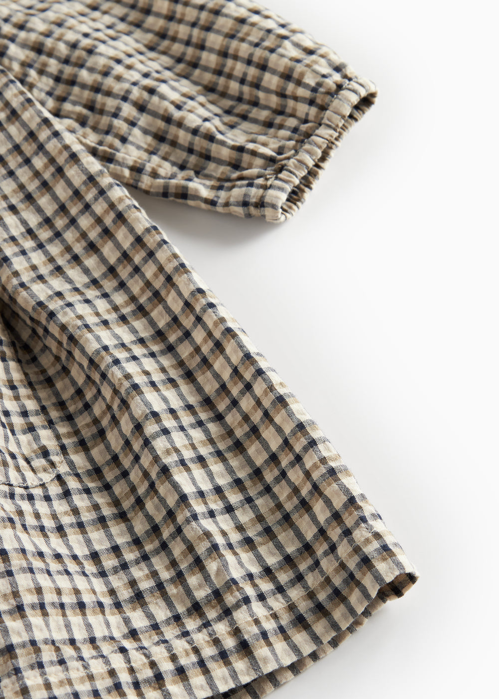 Brun ternet langærmet kjole til børn i crepet bomuld