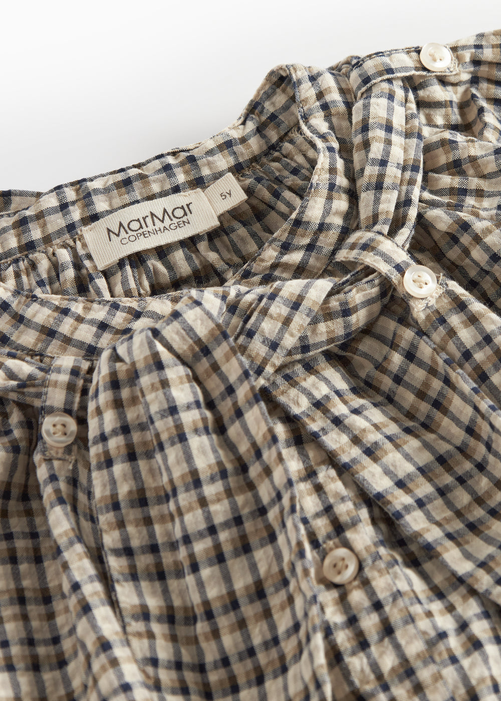 Brun ternet bluse til børn med sløjfedetalje i halsen