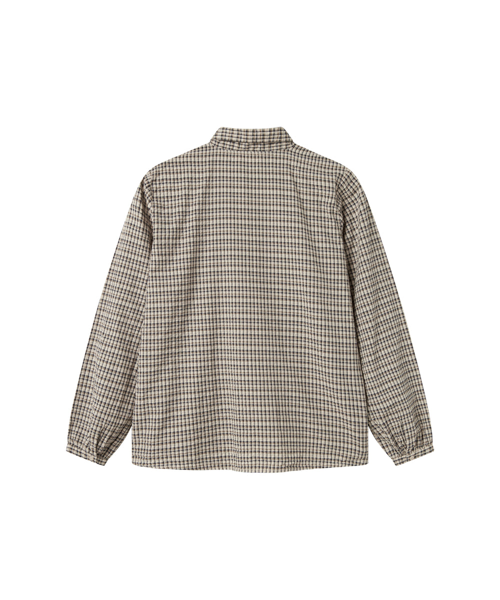 Brun ternet bluse til kvinder med sløjfe i halsen