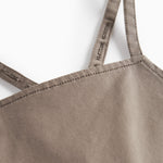 Detaljebillede af stropper på selebukser til børn