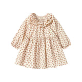 Kjole med blomstermønster og rund flæsekrave