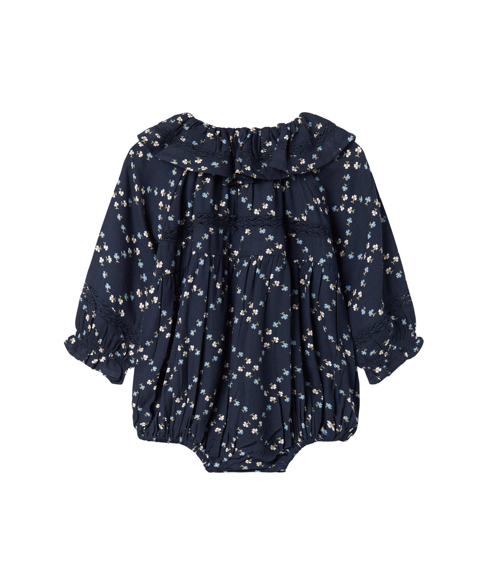 Mørkeblå blomstermønstret heldragt til baby med lange ærmer