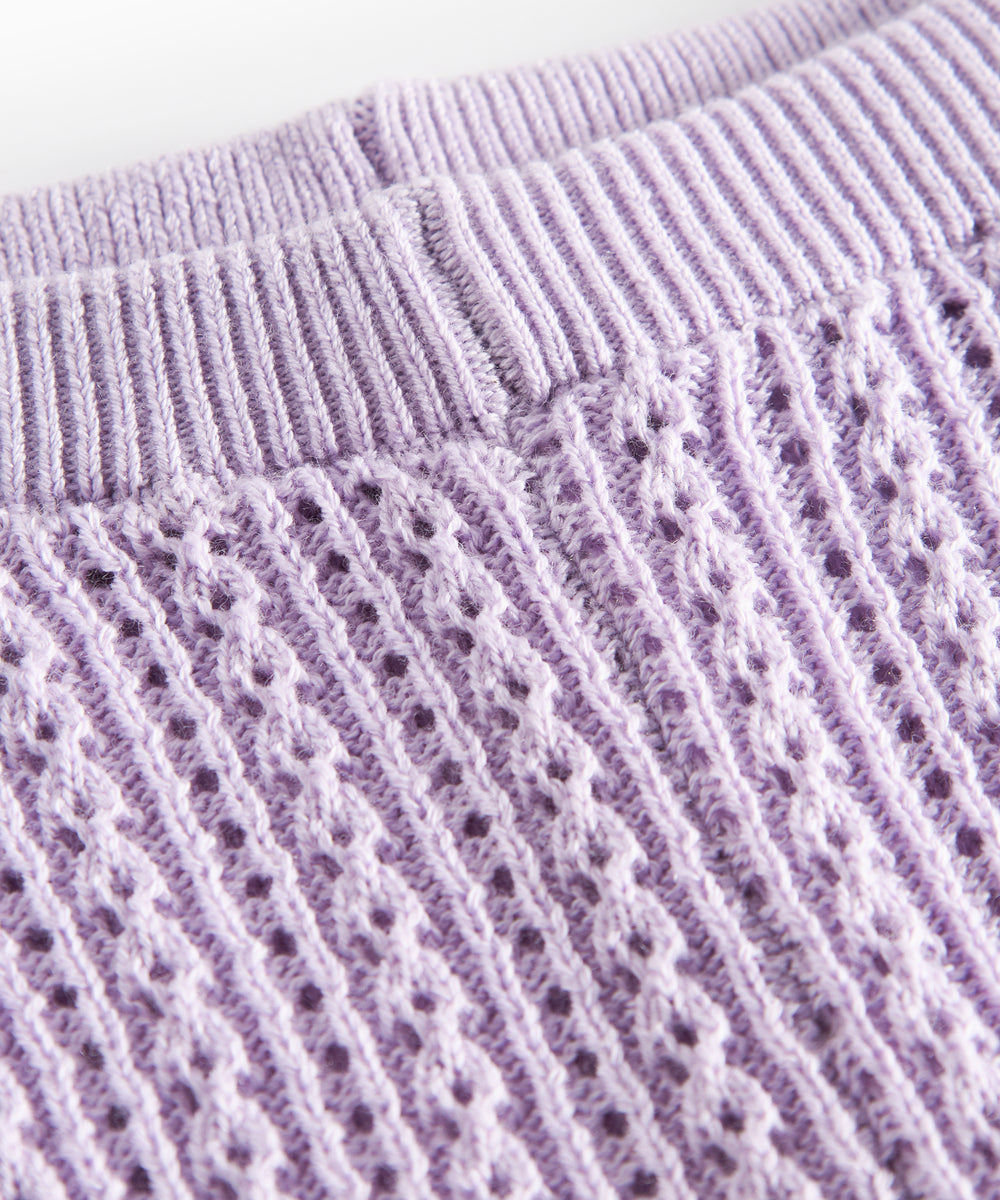 Strikkede lilla leggings til baby i blødt bomuld