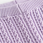 Strikkede lilla leggings til baby i blødt bomuld