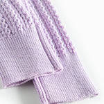 Strikkede lilla leggings til baby i blødt bomuld