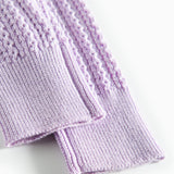 Strikkede lilla leggings til baby i blødt bomuld