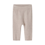 Beige strikkede babybukser med elastik i taljen