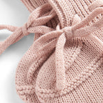 Lyserød strik babyfutter