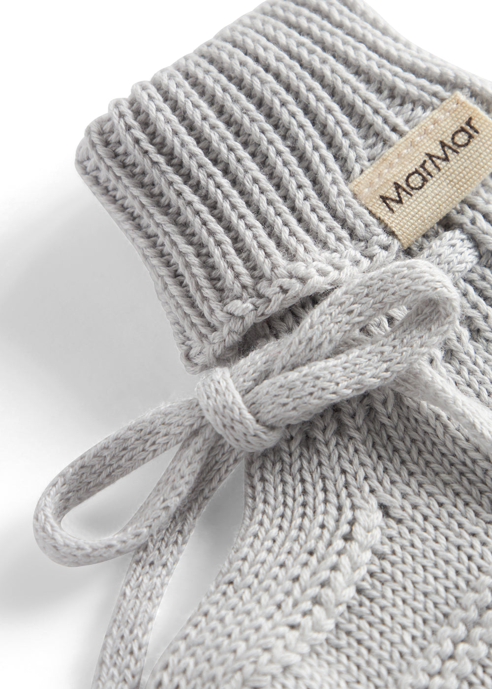 Grå strik babyfutter