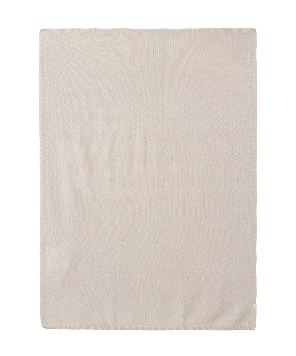 Beige strikket babytæppe