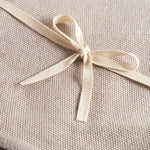 Beige strikket babytæppe