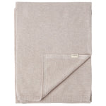 Beige strikket babytæppe