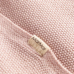 Lyserød strikket babytæppe