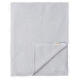 Grå strikket babytæppe