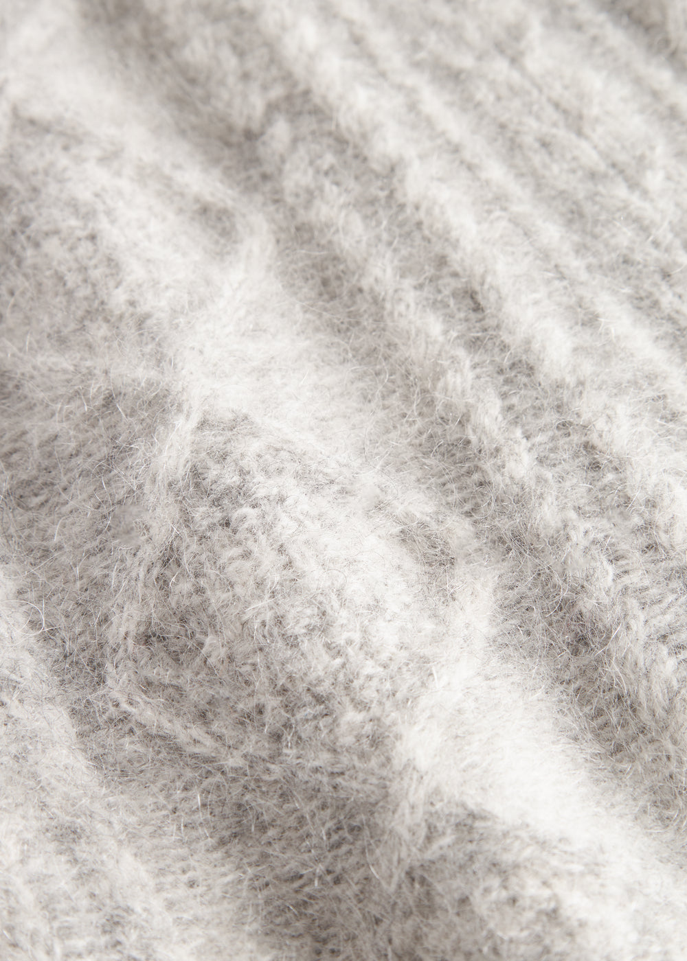 Strikvest til børn i lysegrå uld med kabelmønster