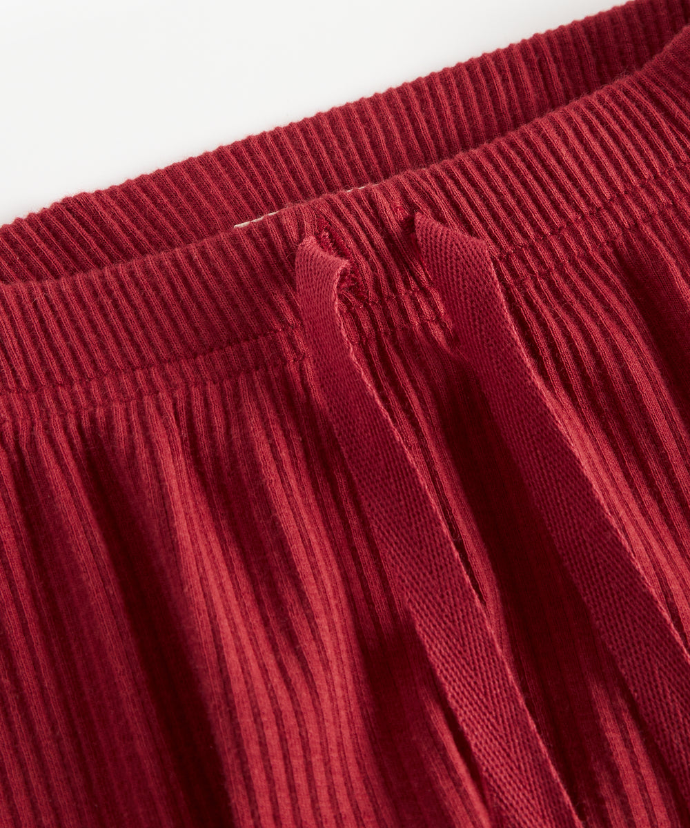 Røde ribbede babybukser med snøre i taljen