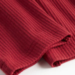 Røde ribbede babybukser med snøre i taljen