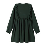 Grøn ribstrikket julekjole med flæser på skuldrene til børn