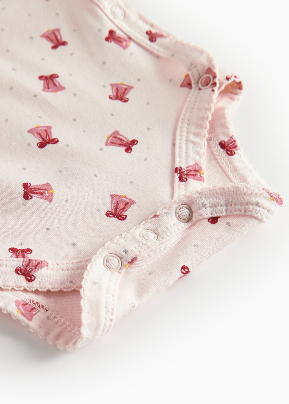 Slå-om body med rødt juleklokkeprint til baby