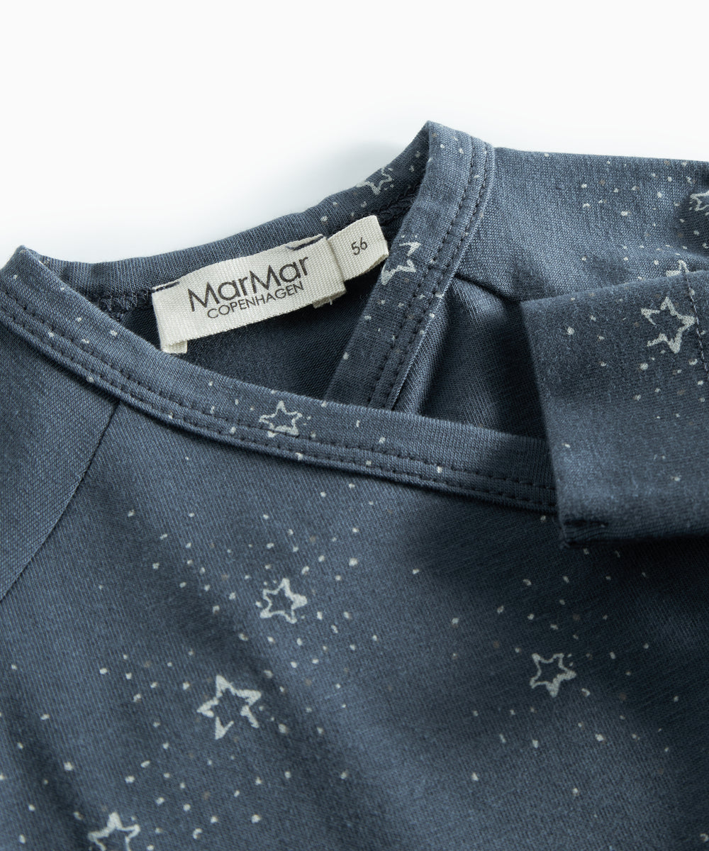 Mørkeblå slå-om bodystocking med stjerneprint til baby