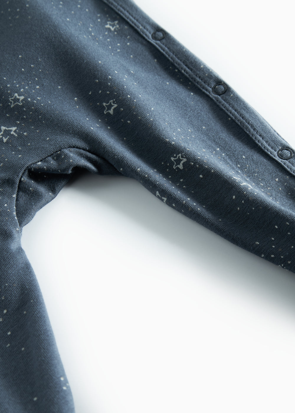 Mørkeblå heldragt med stjerneprint til nyfødt