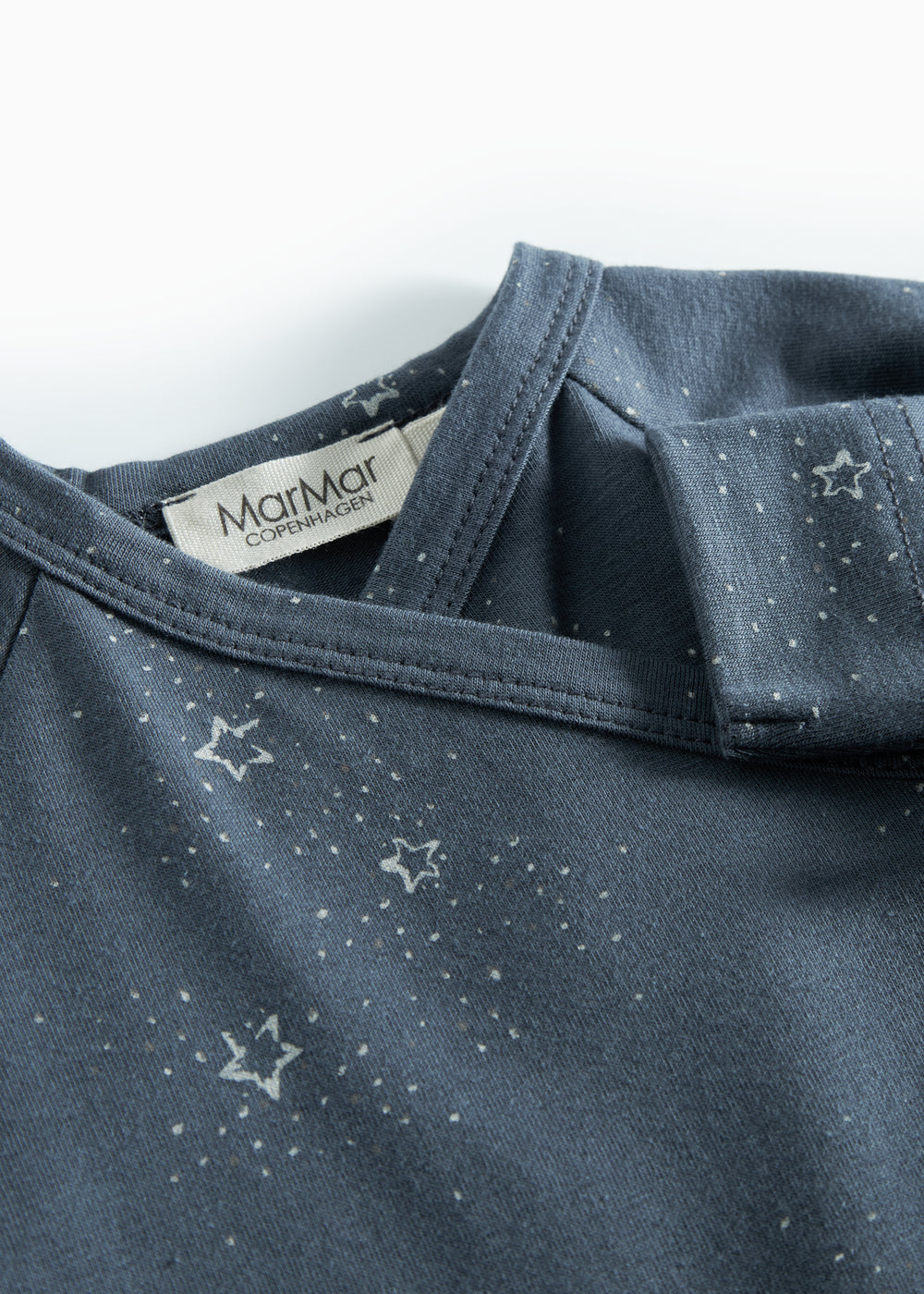 Mørkeblå heldragt med slå-om lukning og stjerneprint til baby