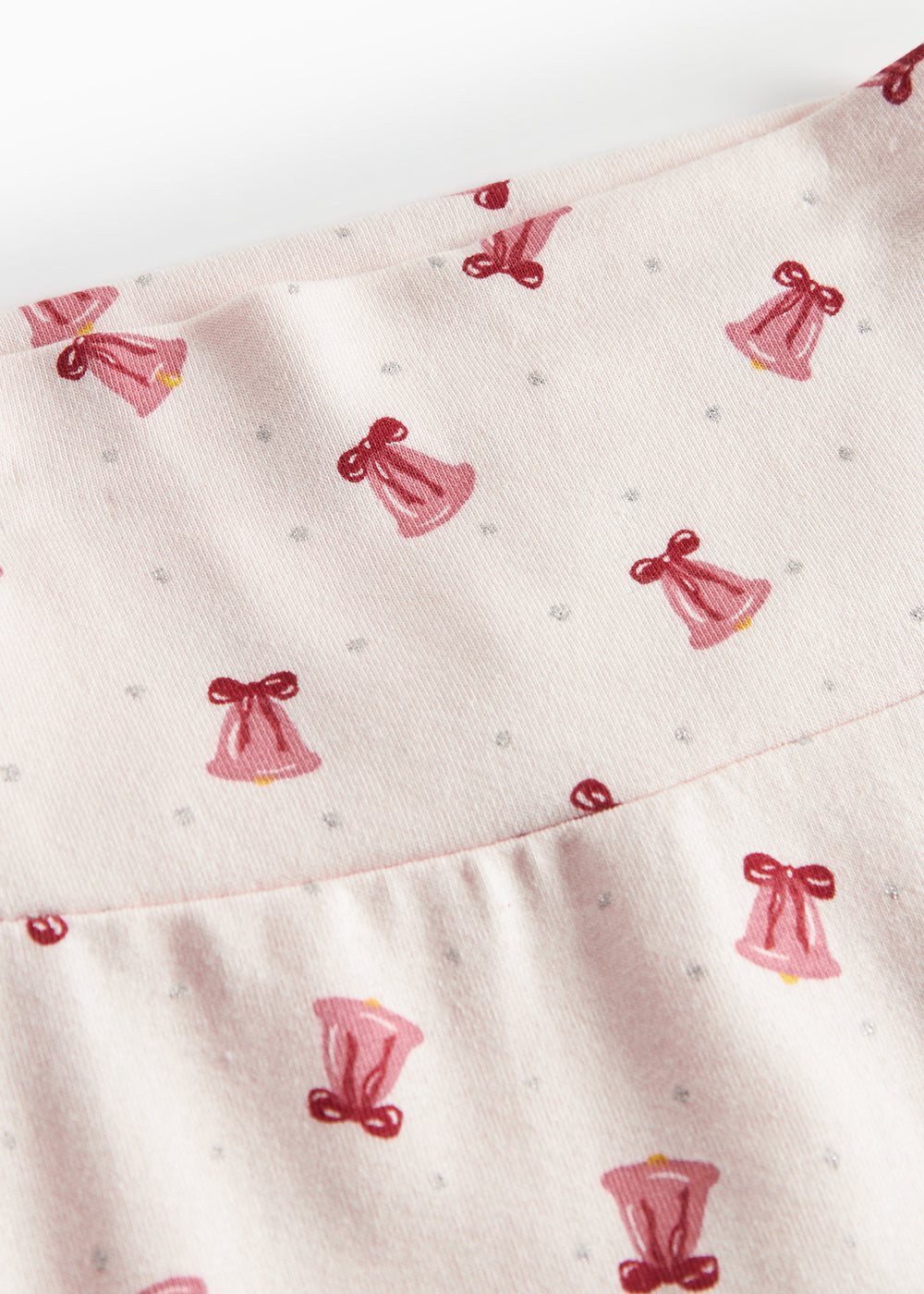 Babybukser med rødt juleklokkeprint og fødder