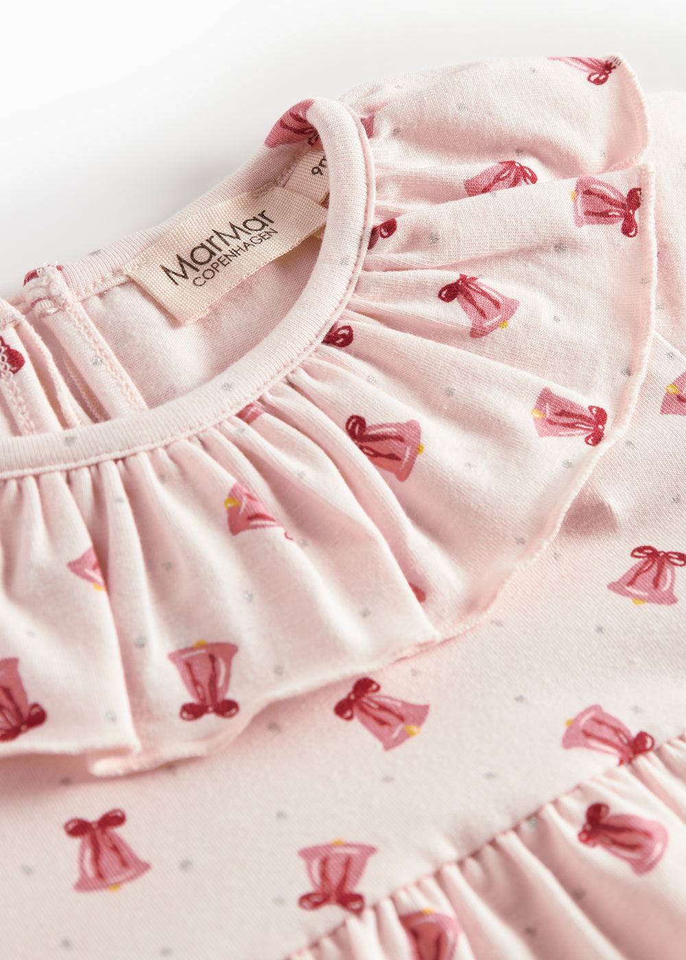 Cremefarvet kjole med røde juleklokker til baby