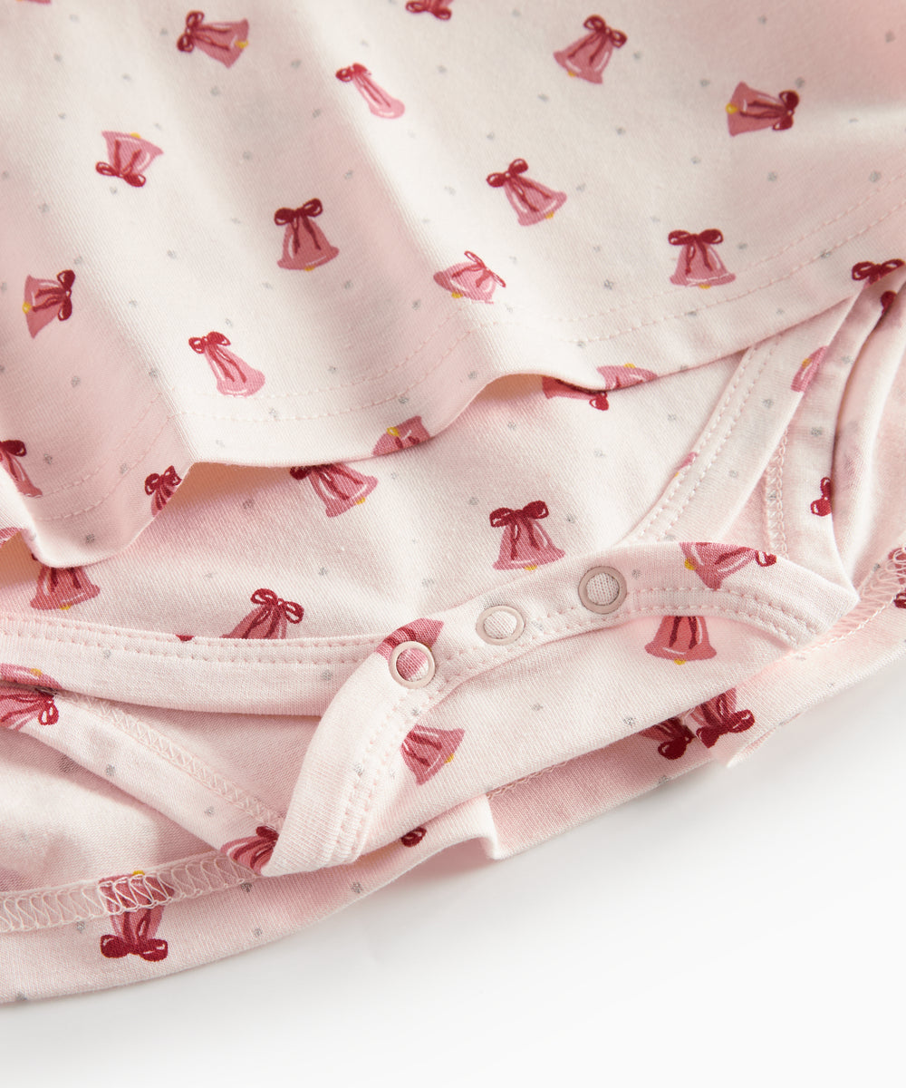 Cremefarvet kjole med røde juleklokker til baby