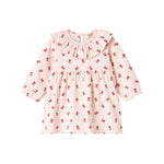 Cremefarvet kjole med røde juleklokker til baby