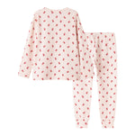 Cremefarvet julepyjamas med mønster af røde juleklokker til børn