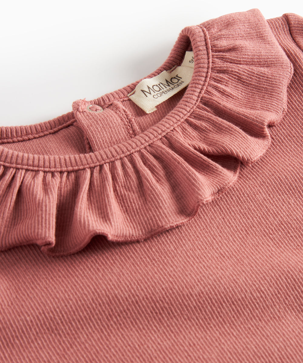 Støvet rosa bluse med flæsekrave og lange ærmer til børn