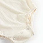 Creme hvid bodystocking med krave og lange ærmer til baby