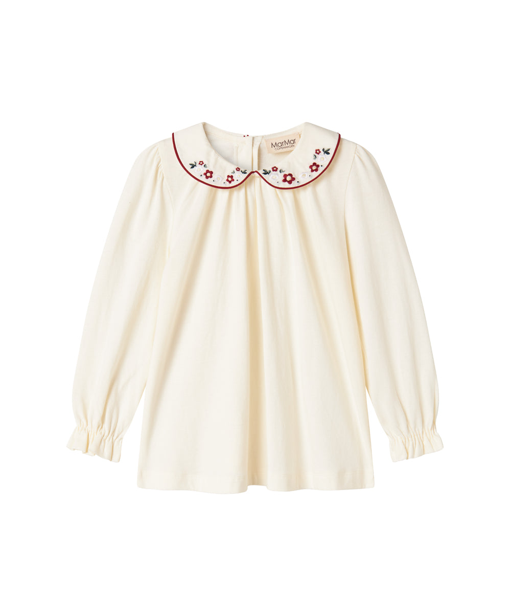 Hvud festbluse med hvid krave og små blomsterbroderier til børn