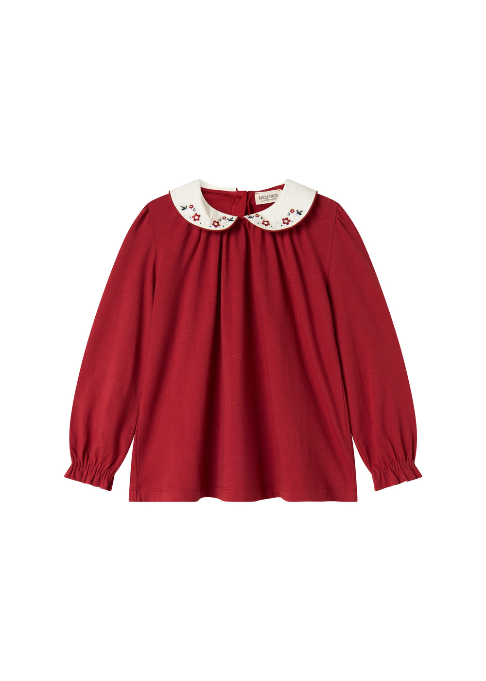 Rød julebluse med hvid krave og små blomsterbroderier til børn