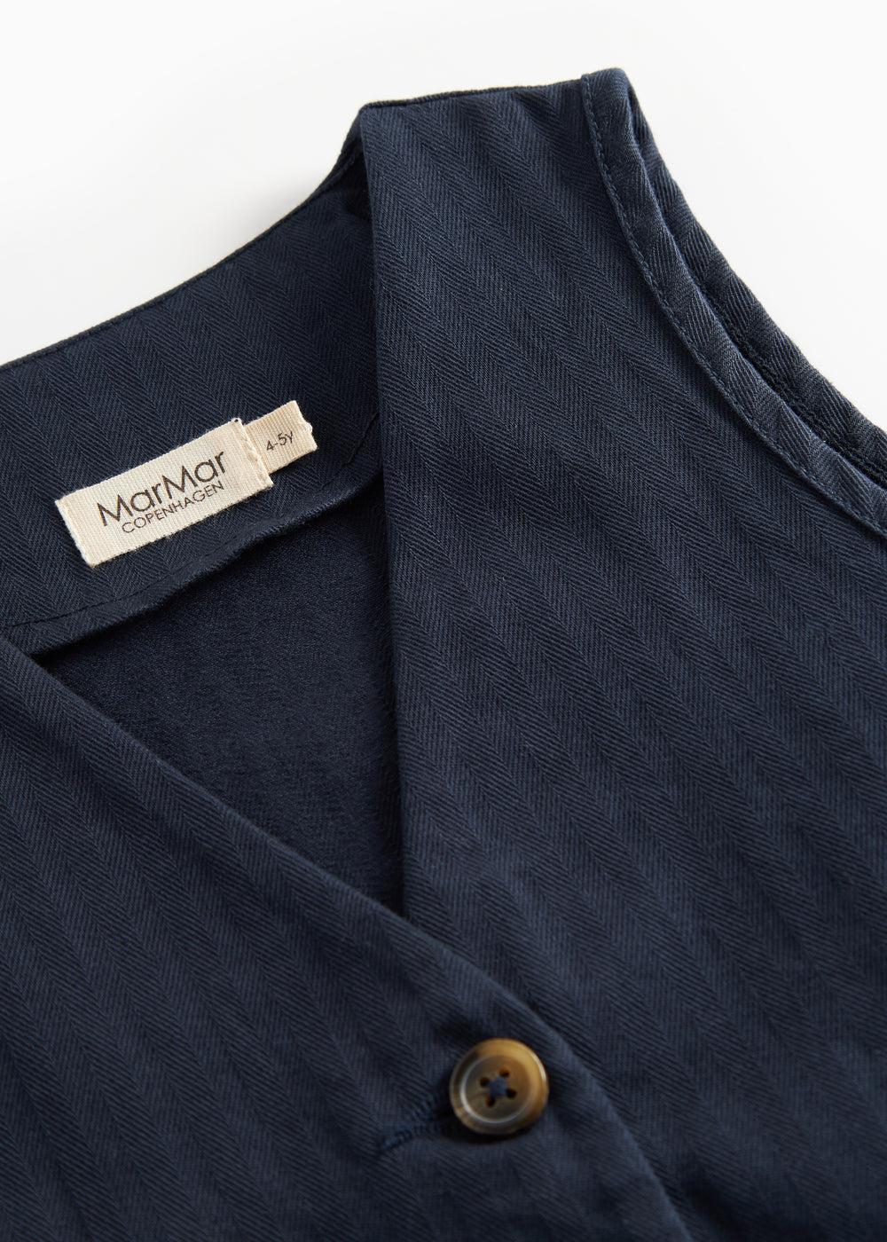 Mørkeblå vest med knapper og lommer til børn