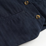 Mørkeblå vest med knapper og lommer til børn