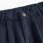 Mørkeblå festbukser med knaplukning og lommer til børn