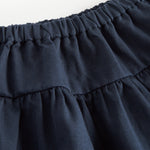 Mørkeblåt nederdel med elastisk talje og let struktur til børn