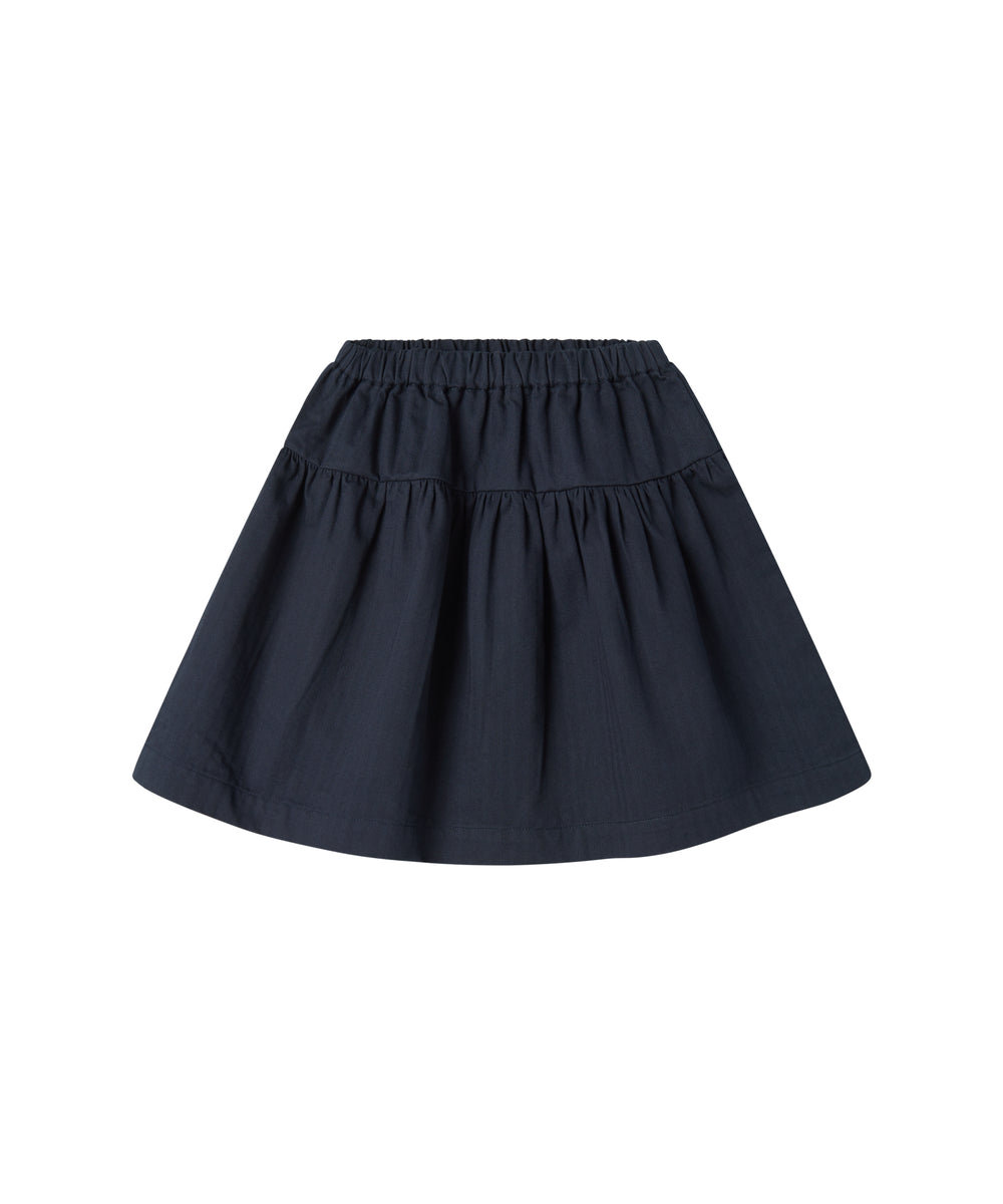 Mørkeblåt nederdel med elastisk talje og let struktur til børn