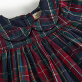 Mørkeblå og rød ternet julekjole med krave og lange ærmer til baby