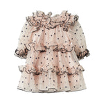 Lyserød julekjole i tyl med sorte prikker og flæser til baby