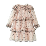 Lys beige langærmet festkjole i tyl med sorte prikker og flæsedetaljer til børn