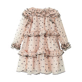 Lys beige langærmet festkjole i tyl med sorte prikker og flæsedetaljer til børn