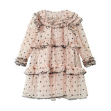 Lys beige langærmet festkjole i tyl med sorte prikker og flæsedetaljer til børn