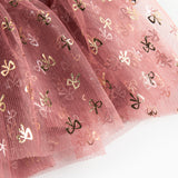 Rosa festlig babykjole i tyl med flæser og guldprint